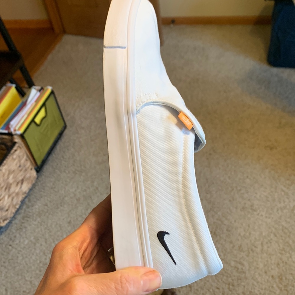 Nike slip on canvas shoes. Ladies 10